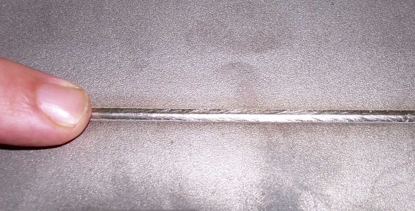 This is what a seam looks like when welding thin metal butt-weld with a heat-conducting wire laid from below