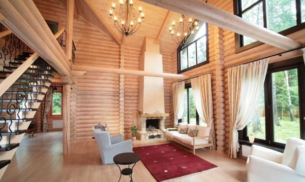 This is the interior of a house made of rounded logs. They are slightly whitened inside. The photo does not convey all the charms, but you can understand what it is about