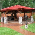 Hexagonal gazebo on stone pillars