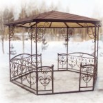 An openwork gazebo made of metal - a summer option for a summer residence or in the yard near the house