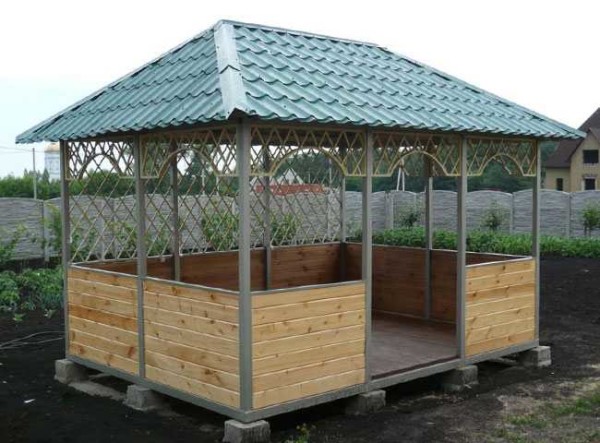 This is a gazebo made of a shaped pipe on posts