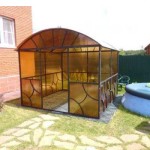 Metal sheathed in orange polycarbonate - even on a cloudy day it will be sunny in the gazebo. This is a great option for regions where the sun is a rare guest.
