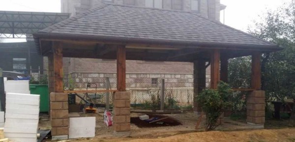 The first step is to drive out the columns and cover them with a roof
