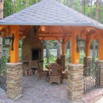 This option is both stone and wood. Oprah from a bar are installed on the columns of rubble stone