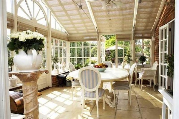 Putting a flowerpot on a separate stand in the form of a small column is far from a summer cottage solution, but making a forged stand or attaching several flowerpots on racks - everyone can do it