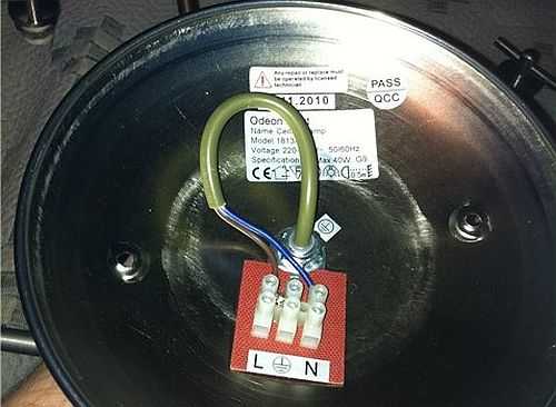 How to connect a chandelier if it only has two wires? To the same wires on the ceiling in no particular order