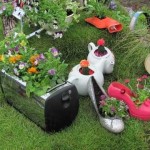 Broken toaster, old kettle and shoes - and this is also a flowerbed