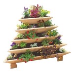 Flowerbed-pyramid of small boxes, different sizes, set one after another
