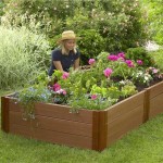 Wooden flower beds knocked down from boards are built in a few hours