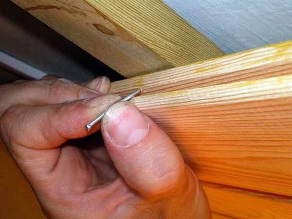 Fastening the lining with a nail (self-tapping screw, staple) into the groove