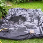 Lay out the film, slightly straightening the folds