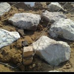 The site was still entangled with wire - so that the clay would not float and the site did not sink