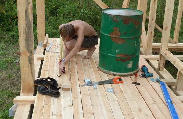 One of the stages of building a veranda: flooring