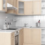 The combination of shades of beige and white - a classic design for small kitchens
