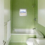 A combination of mosaic tiles and a lighter shade of large tiles. Green bathroom design turned out to be successful