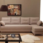 Wall, TV and sofa - such classic elements are usually present in the hall in the apartment