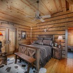 Bedroom in a wooden country house in country style