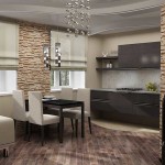 In the photo, the division of the kitchen and living room area using different textures of the flooring