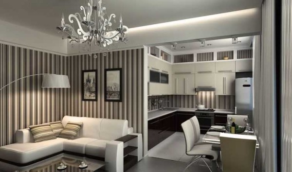 You cannot remove the partition between the kitchen and the living room, but you can expand the doorway