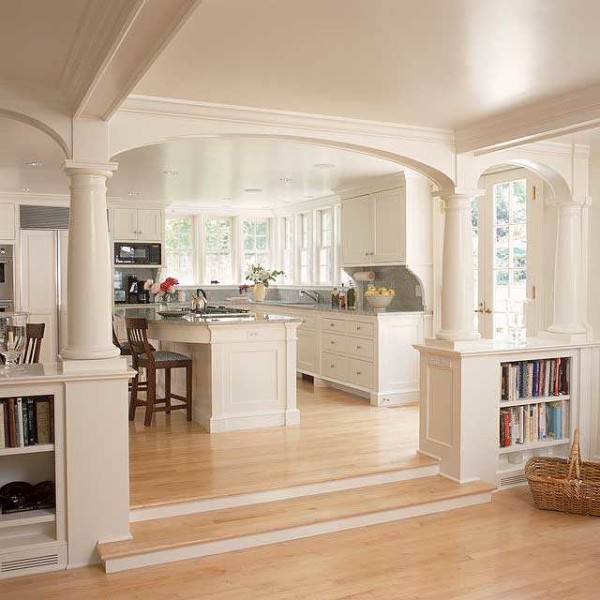 It is impossible to remove the load-bearing wall, but you can put columns instead, which will have the same load-bearing capacity
