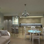 In the photo, the kitchen turning into the living room has two types of lighting - illumination of the working area and a classic chandelier in the center of the recreation area