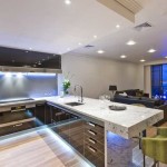 In the photo is a kitchen studio, interior design in the style of minimalism