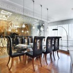 Glass partition with a gold pattern - a chic idea for a spacious combined kitchen-living room