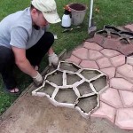 This is how they pave the path in the country or near the house using ready-made forms into which concrete mortar is poured