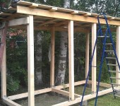 It looks like a woodshed with a finished roof