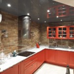 An apron for a kitchen under a brick is made from a hog tile