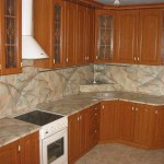 The kitchen countertop and backsplash are the same color