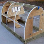 Such a chicken coop is built super-quickly: boards are knocked down around the perimeter, plastic pipes are fixed, partitions are cut out of OSB. The mini-chicken coop for 5 chickens is almost ready - it remains to fix the film over the pen and something denser over the shed