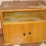 This is an old bedside table. We will limit it