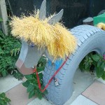 Donkey from half a tire - muzzle made of wood