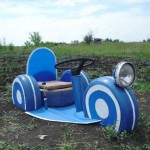 Motorcycle with a sidecar made of old tires ...