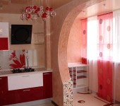 Successful repetition of the pattern on the curtains and the shape of the chandelier