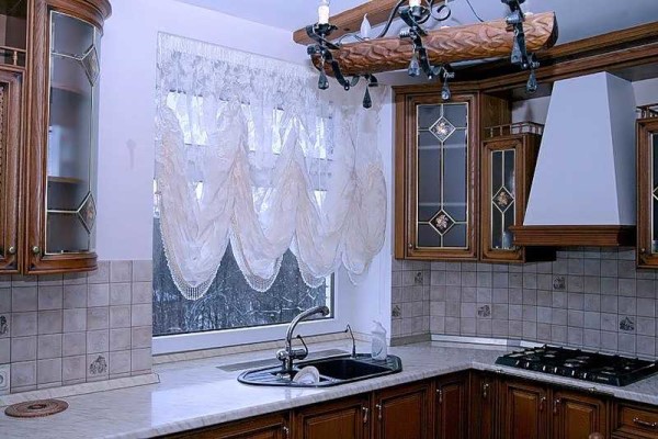 Fancy Austrian curtains make the room elegant