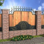 This fence combines three materials at once: brick, metal and wooden shields. Everything looks decent
