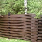 Board fence: the boards are curved between the posts - beautiful and reliable
