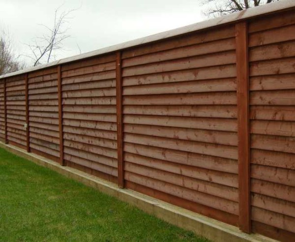 Herringbone wooden fences create a solid coverage