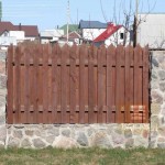 One of the options for a checkerboard fence on a plinth and with stone pillars