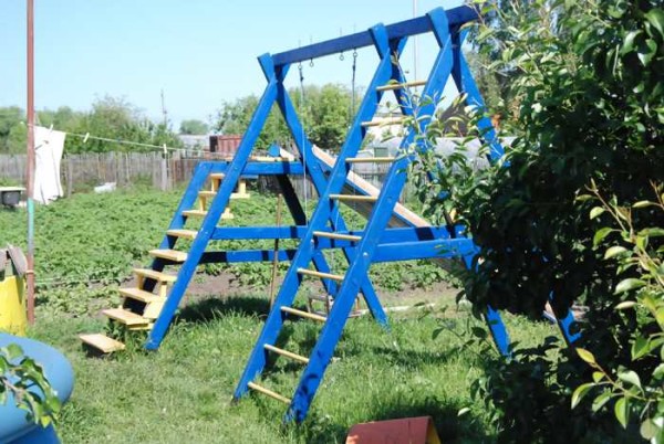 Combination of stairs and swings