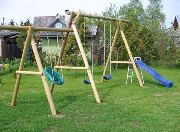 Different types of children's swings in one complex