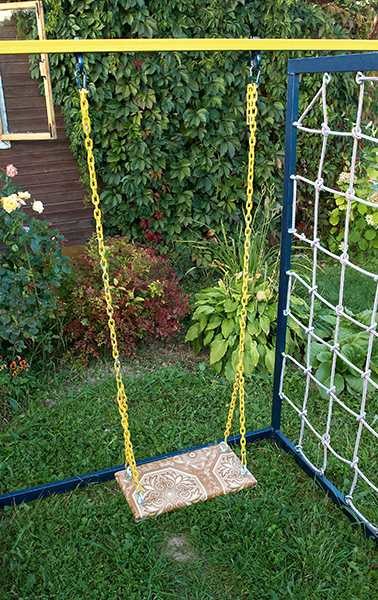 A piece of board can be a seat for a hanging children's swing