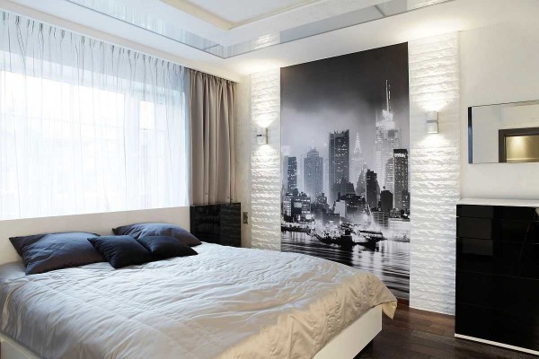 Another option for a black and white bedroom with a slight addition of golden beige