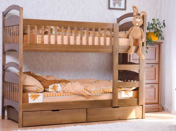 Two identical beds are put one on top of the other and fastened