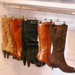 The way to store boots is on hangers with clothespins