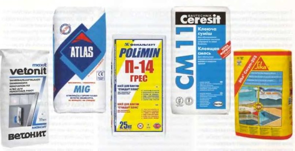 Any building materials store will offer several types of tile adhesive