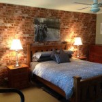 Wallpaper under a brick wall ...