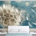 Airy dandelion on a blue background - freshness guaranteed